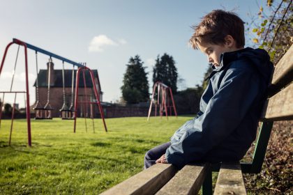 bigstock-Upset-problem-child-sitting-on-114610115-1-e1502906822701